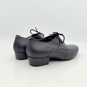 Alvin art. 403 Nicole Rimini vista laterale, vera pelle nera, lacci cotone 2CAL, tacco standard 2,5 cm, tomaia chiusa pianta larga, scarpe da ballo folk liscio romagnolo caraibici bambino kids child artigianali italiane
