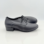 Dettaglio lacci cotone non cerati Mod. 2CAL Alvin art. 403 Nicole Rimini, tomaia chiusa in vera pelle nera adatta a piedi regolari e pianta larga, scarpe da ballo folk liscio romagnolo caraibici bambino kids child
