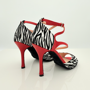 
Amèlie art.144 Nicole Rimini scarpe da ballo kizomba vista frontale tessuto zebrato glitterato brillante pelle rossa tacco spillo 10HS cinturino incrociato 2CAI punta aperta F1P1 fascia semplice memory gel artigianale made in Italy

