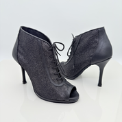 Audrey art. 240G heels dance tessuto glitter fine nero vera pelle nera tacco spillo 10HS suola bufala spazzolata pavimenti interni punta spuntata F4P1 apertura piccola 2 dita Nicole Rimini vista posteriore
