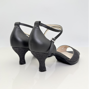 Elisa art. 117 Nicole Rimini scarpa donna pelle nera glitter fine nero fascia farfalla cinturino incrociato alla caviglia punta aperta semi-arrotondata tacco rocchetto 5 cm plateau 1 cm suola bufala memory gel artigianale italiana
