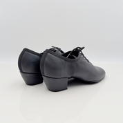 Enea art. 301B Nicole Rimini laterale — vera pelle nera, lacci cotone 2CAL, tacco latino 4 cm, tomaia chiusa pianta larga, scarpe da ballo latino americano standard bambino kids child artigianali italiane
