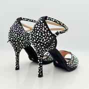 Nicole scarpe da ballo caraibici Ines 185S3 vista frontale raso nero strass aurora boreale super brillante tomaia farfalla cinturino 2CAI doppio incrocio tacco spillo 10cm plateau bachata kizomba stabilità
