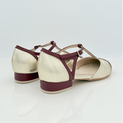 Vista laterale Jen art. 415 Nicole Rimini pelle laminata platino bordeau bicolore tacco basso 1,5 cm cinturino caviglia 2CAB punta chiusa F5P4 tomaia T-bar suola cuoio scarpa swing donna
