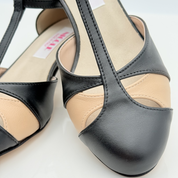 Vista posteriore Joey art. 414 Nicole Rimini tacco quadrato 3,5HQ punta chiusa F5P4 pelle bicolore nera avorio scarpa ballo swing donna stile vintage anni 50 60 made in Italy

