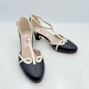 Dettaglio tomaia Karen art. 406 Nicole Rimini fascetta a T nasetto centrale Mod. 2CAB pelle nera panna cinturino semplice caviglia pianta larga piede regolare scarpa swing lindy hop charleston
