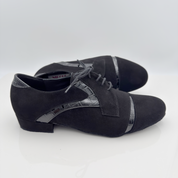 Dettaglio tomaia Kevin art. 307 Nicole Rimini — camoscio nero pelle verniciata nera Mod. 2CAL lacci cotone non cerati punta chiusa uomo scarpe tango made in Italy
