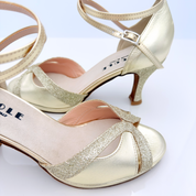 Cinturino incrociato alla caviglia 2CAI scarpe ballo liscio pelle laminata platino glitter tacco rocchetto 7HR plateau 1cm suola bufala Nicole Rimini
