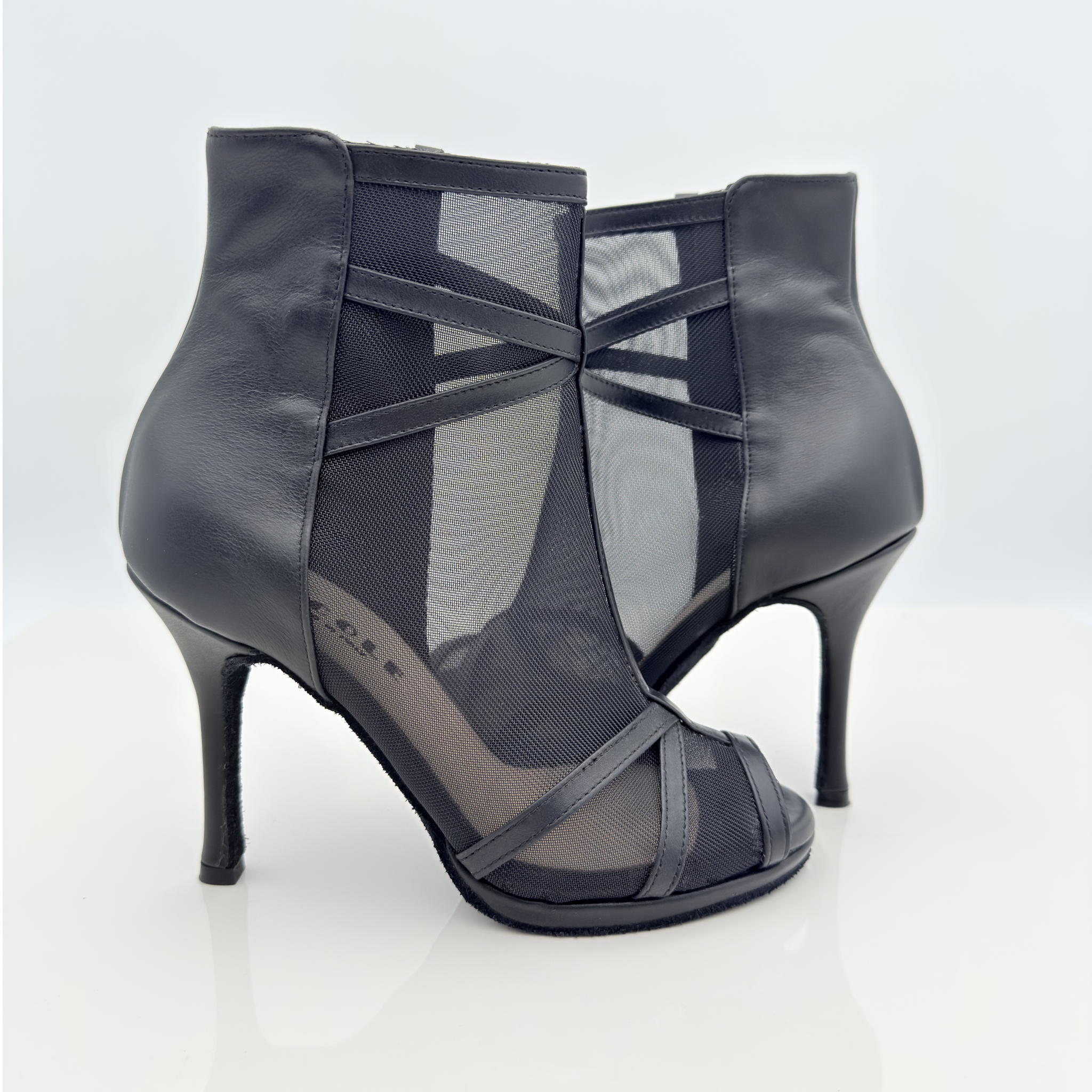 Ruby art. 220 heels dance pelle nera rete trasparente tacco spillo 10HS suola bufala lavorata aderenza ballo punta spuntata poco aperta F4P1 plateau 1cm Nicole Rimini vista posteriore
